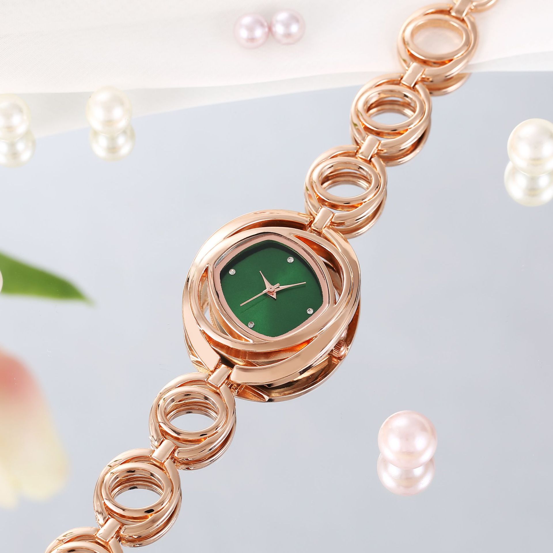 Rose gold shell green surface